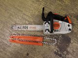 a close up of a chainsaw with a chain attached to it