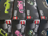 a lot of toy cars that are in the box