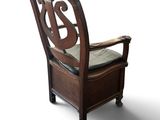 an old wooden chair with a seat made of wood and a seat made out of wood