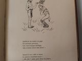 an open book with a drawing of a man and a woman