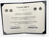 certificate of authenticity of chaumet in a black and white photo