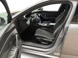 a car door open with the driver ' s seat down