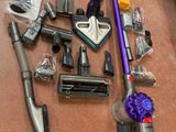 many different types of vacuums and other household items on the floor
