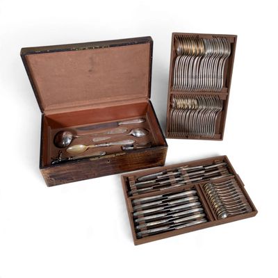 a wooden box with a set of silverware in it