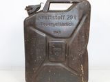 a black jerry can with a metal handle on a white surface