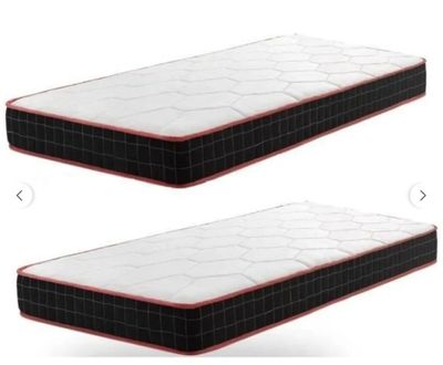 a couple of mattresses that are on top of each other