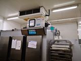 a machine that is sitting in a room with a lot of papers on it