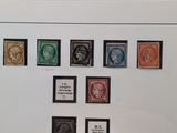 a picture of a picture of a collection of stamps on a wall