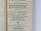 an open book with a black and white title on it