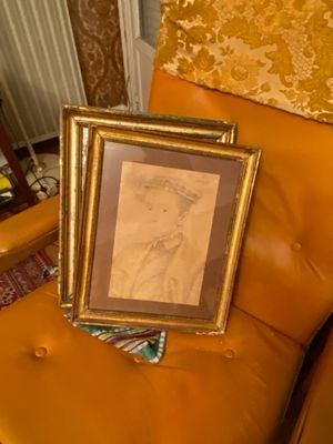 a picture of a picture of a man sitting on a chair