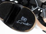 a close up of a pair of shoes with writing on them