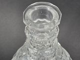 a clear glass vase that is sitting on a table