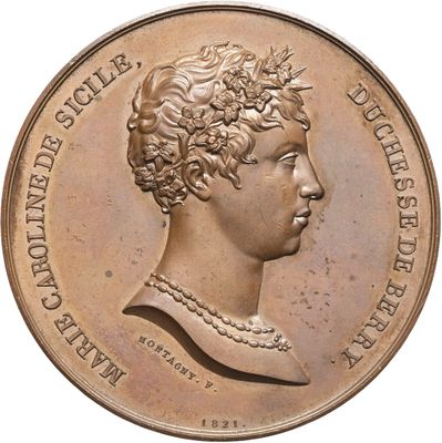 a close up of a coin with a woman ' s face on it