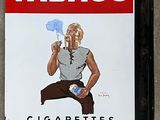une enseigne représentant une cigarette sur la façade d'un immeuble