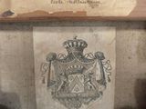 a picture of a picture of a coat of arms on a piece of paper