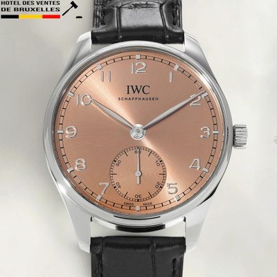 an image of a close up of a wrist watch with a brown dial