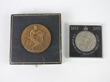 an image of a small box with a coin and a small box with a coin