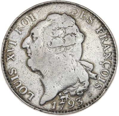 gros plan d'une pièce de monnaie sur fond blanc