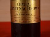 a close up of a bottle of wine on a table