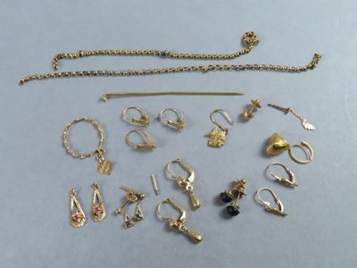 a lot of jewelry that is laying out on the table