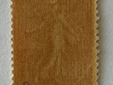 a close up of a piece of paper with a brown color