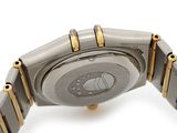 an image of a close up of a wrist watch on a white surface