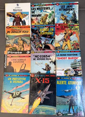 a lot of comic books that are on the table
