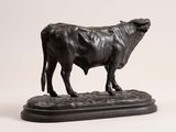 statue of a bull standing on a pedestal on a white background