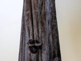 an image of a fur coat on a mannequin stand