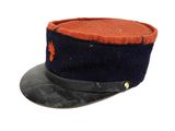 navy officer ' s hat with red and black trim