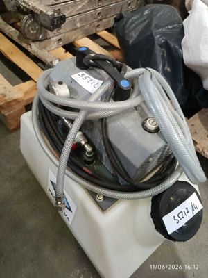 a picture of a tank with a hose attached to it