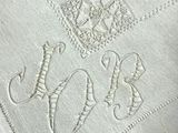 a close up of a napkin with a design on it