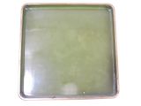 a picture of a green tray with a green liquid inside of it