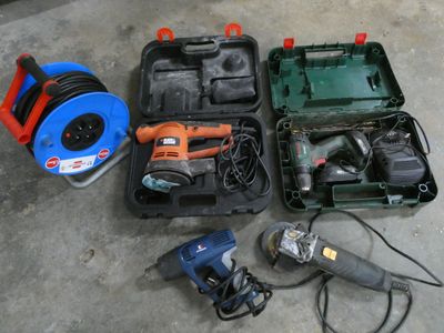 many tools that are laying out on the floor