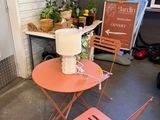 a small table and two chairs in a room