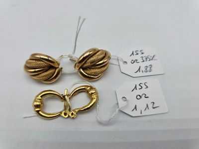 two pairs of gold earrings and a pair of gold rings