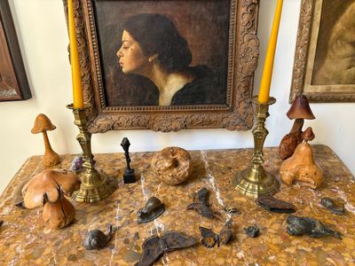 a picture of a table with a picture of a woman and other objects on it