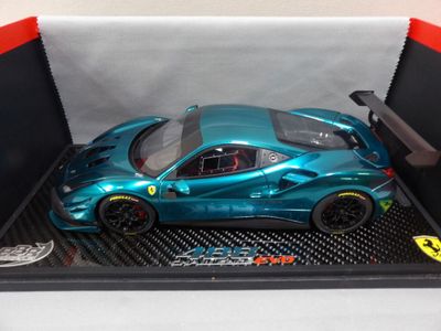 the toy car is in the box ready to be put into the box