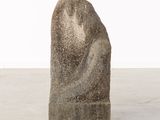 an image of a stone sculpture with a green square in the middle of it
