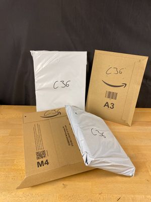 three bags of food sitting on top of a table next to each other