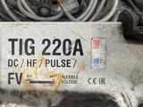 a close up of a car engine with a tag on it