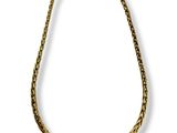 une image d'un collier en or sur fond blanc