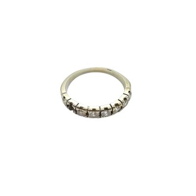 a close up of a ring on a white background