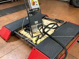 l'image d'une machine installée dans un garage