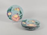 three plates with floral designs are stacked on top of each other