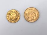 two pieces of gold coins, one of which is a woman ' s head and the other of which is