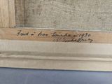 a close up of a piece of wood with writing on it