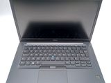 a laptop that is sitting on a white table