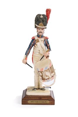 une image représentant une figurine de soldat avec un tambour