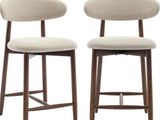 pair of mid century style bar stools with upholstered backrests